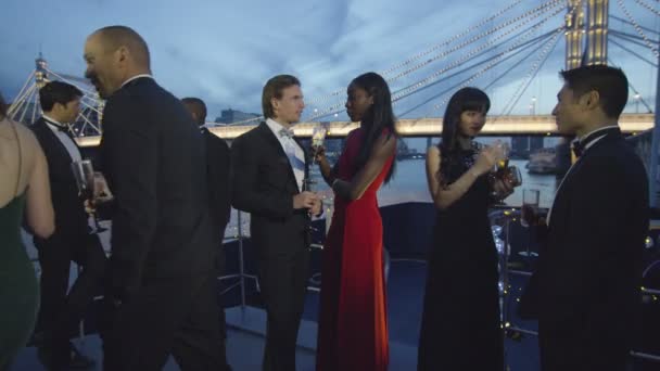 Group socializing at boat party — Stock Video