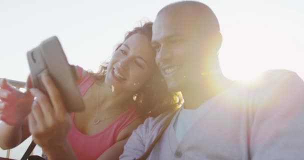 Couple with mobile phone — Stock Video