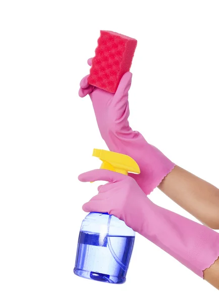 Mãos segurando pulverizador e esponja de limpeza — Fotografia de Stock