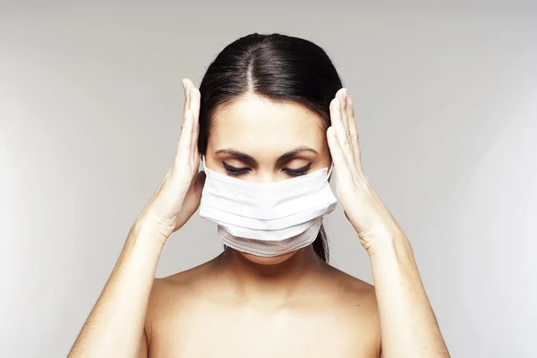 Mulher com máscara protetora — Fotografia de Stock