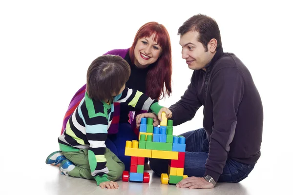 Pai, mãe e filho brincando de lego — Fotografia de Stock