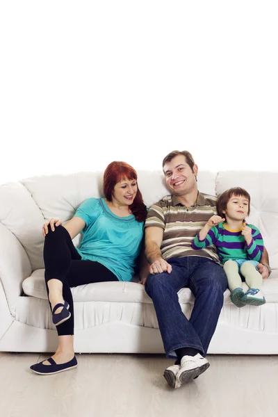 Father, mother and son sitting on the sofa — Stock Photo, Image