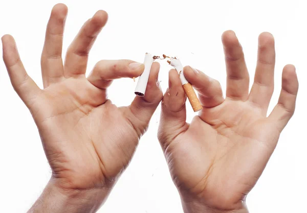 Hand crushing cigarette — Stock Photo, Image