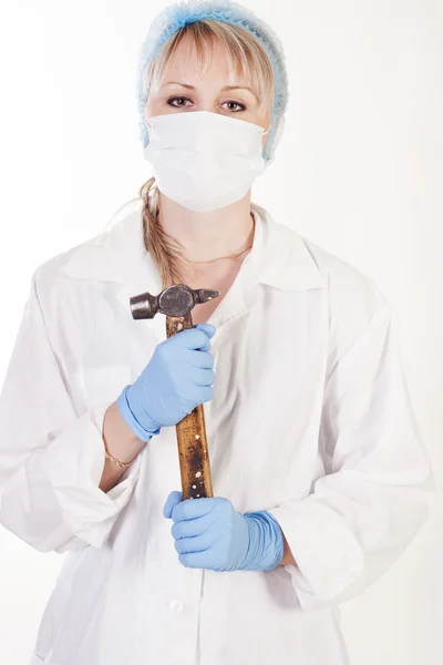 Young doctor with hammer — Stock Photo, Image