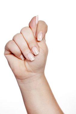 bir incir gösterilen el