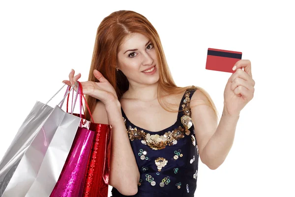 Jonge vrouw maakt winkelen met credit card — Stockfoto