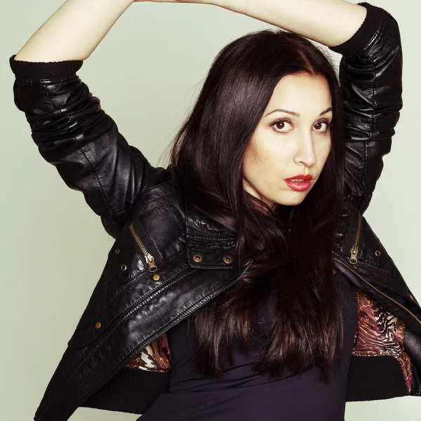 Portrait of sexy beautiful young woman in leather jacket — Stock Photo, Image