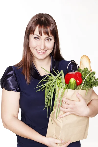 Portrait of beautiful woman with a bag of products — Stock Photo, Image
