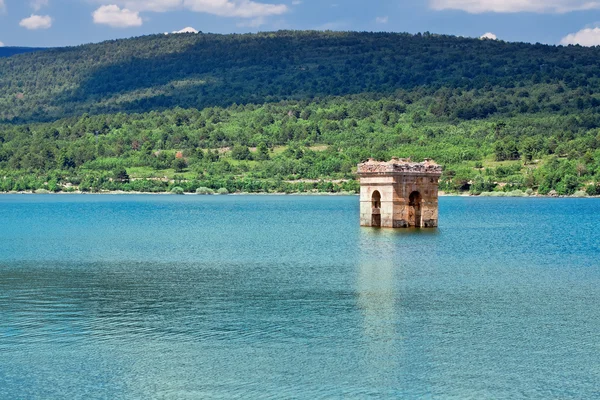 Destruction of old bell tower of submerged village Muedra  forma — Stock Photo, Image