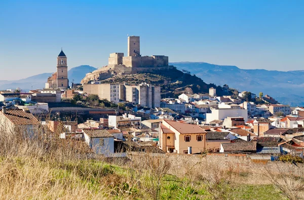 Alcaudete with castle and old church. Province of Jaen, Spain Royalty Free Stock Images