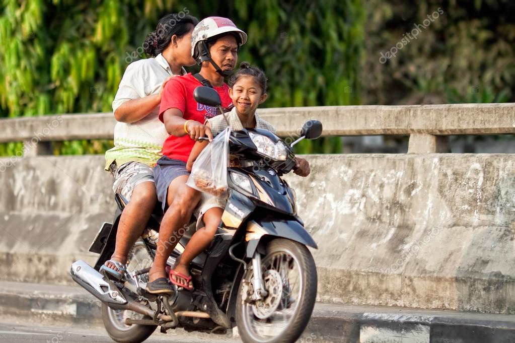 baby riding motorcycle