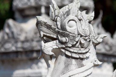 Ancient dragon sculptures in temple Phra Yuen in Lamphum, Thailand