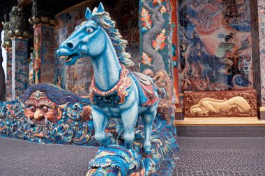 Sculpture of mythical creatures in temple Ban Rai, Thailand