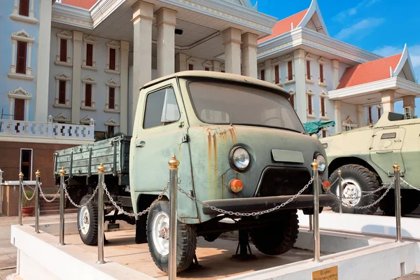 Civilian and military vehicles supplied by  Soviet Union in form of aid about National History Museum, Vientiane, Laos Rechtenvrije Stockafbeeldingen