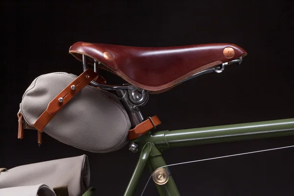 Stylish vintage bicycle saddle — Stock Photo, Image