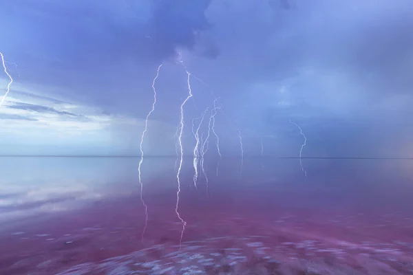 Thunderstorm over the pink lake with extremely salted water. — Stock Photo, Image