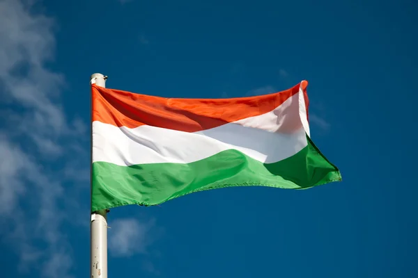 Hungarian flag against blue sky — Stock Photo, Image