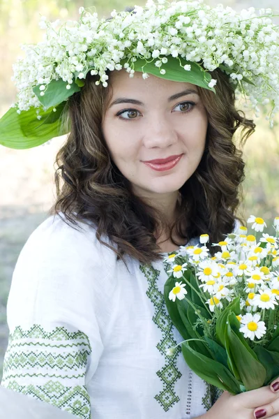 Portrait of a young beautiful in traditional Ukrainian shirt — Stock Photo, Image