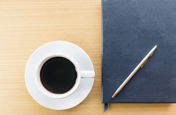 Coffee cup and notebook — Stock Photo, Image