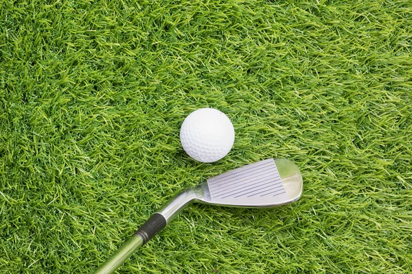 Golf ball before hitting with golf club — Stock Photo, Image