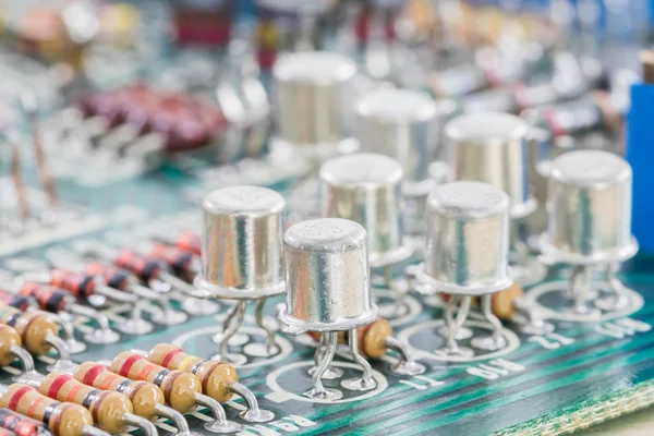 Condensers and Resistor assembly on the circuit board — Stock Photo, Image