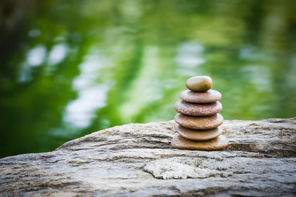 Stack of zen rocks in garden — Stock Photo, Image