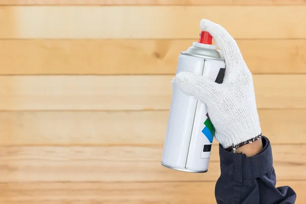 Hand holding spray paint can — Stock Photo, Image