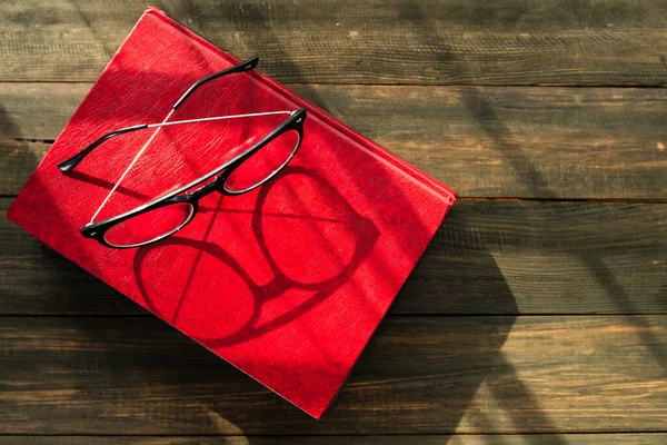 Reading Glasses Put Hardcover Books Wooden Table — Stock Photo, Image