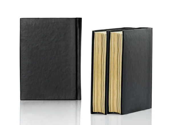 Closed black book is laying on white background — Stock Photo, Image