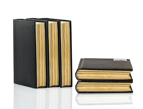 Closed black book with shadow on white background — Stock Photo, Image