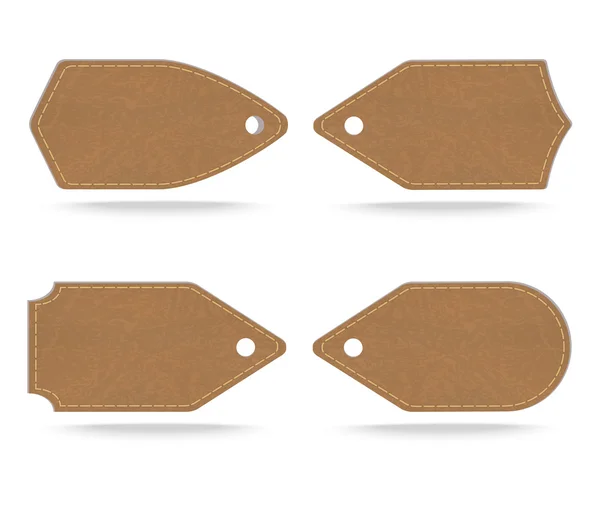 Set de etiquetas de cuero sobre fondo blanco — Archivo Imágenes Vectoriales
