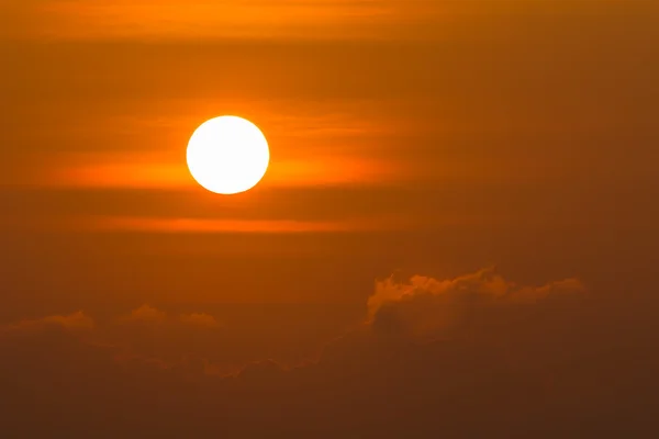Sunrise over clouds with bright yellow sun on a morning — Stock Photo, Image