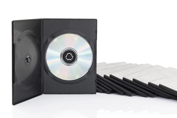 Caixa de DVD com disco sobre fundo branco — Fotografia de Stock