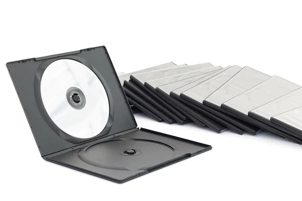 Caixa de DVD com disco sobre fundo branco — Fotografia de Stock