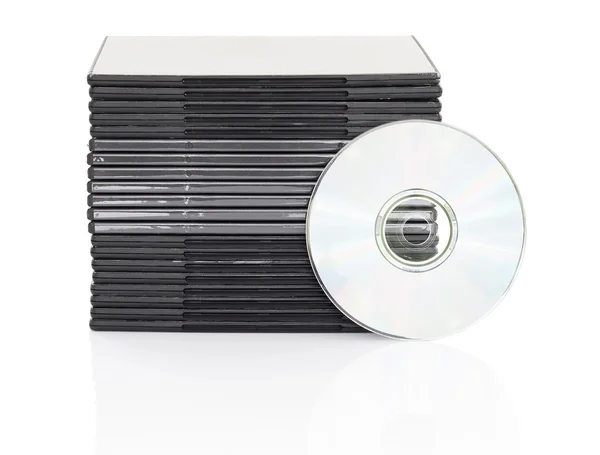 Caixa de DVD com disco sobre fundo branco — Fotografia de Stock