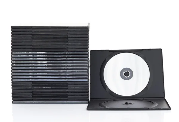 Scatole DVD con disco su sfondo bianco — Foto Stock