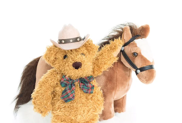 Cowboy Teddy bear and horses — Stock Photo, Image