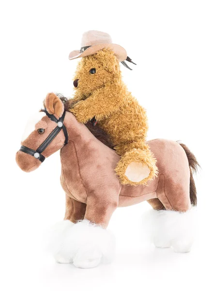 Cowboy osito de peluche montando un caballo — Foto de Stock