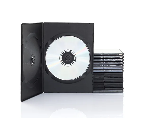 Scatole DVD con disco su sfondo bianco — Foto Stock