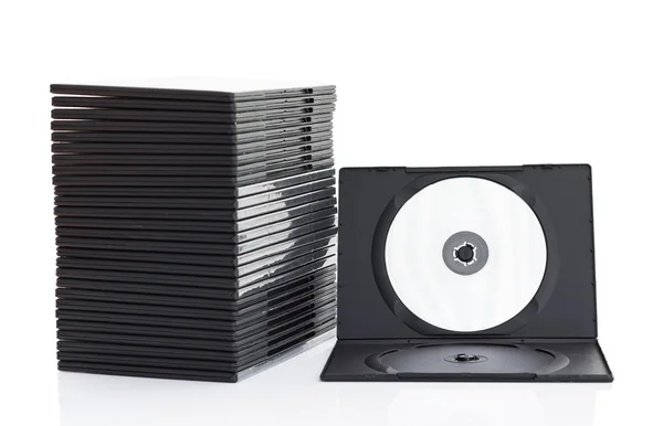 Scatole DVD con disco su sfondo bianco — Foto Stock