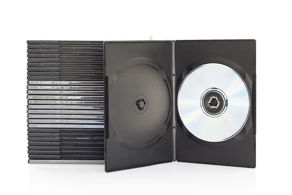 Scatole DVD con disco su sfondo bianco — Foto Stock