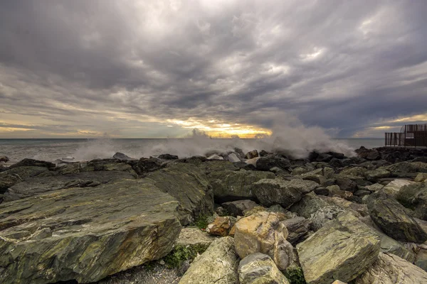 Waves and clouds Stock Image