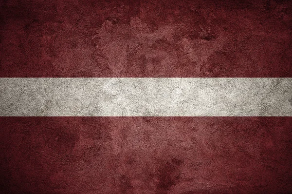 Bandeira da Letónia na parede — Fotografia de Stock