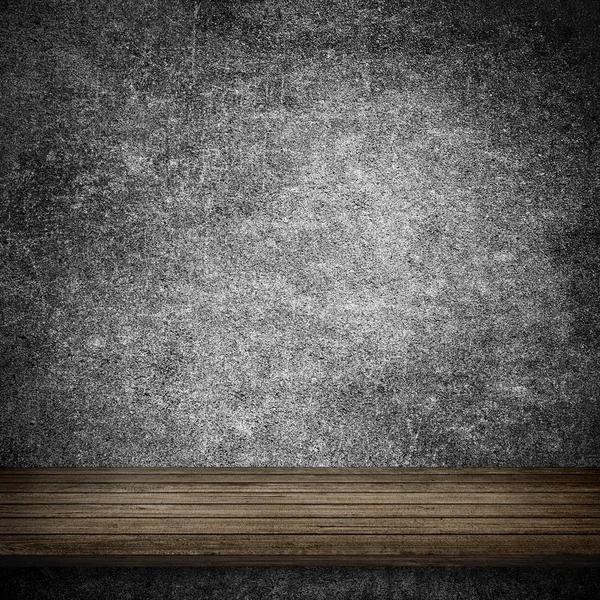 Tavolo in legno e muro in cemento grigio — Foto Stock
