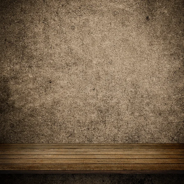 Wood table and brown concrete wall — Stock Photo, Image