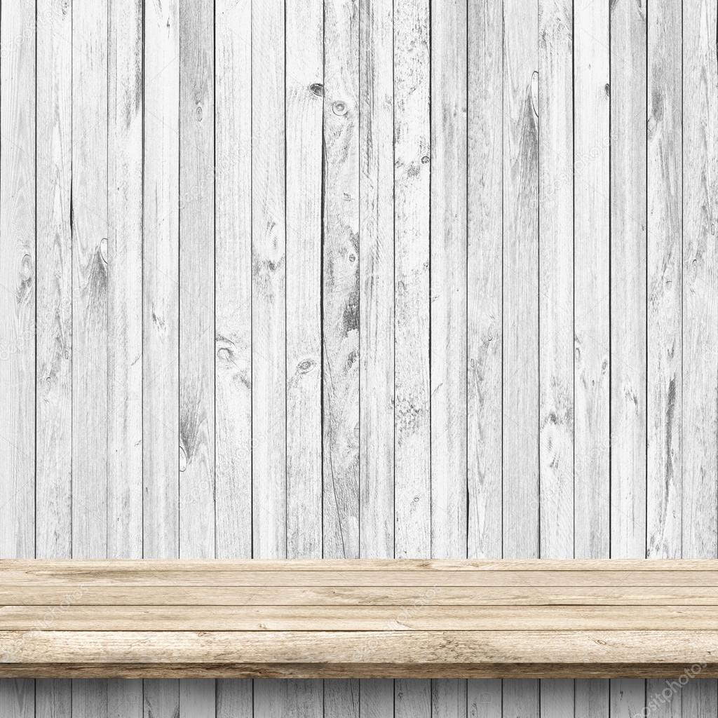 Wood table and white wooden wall 