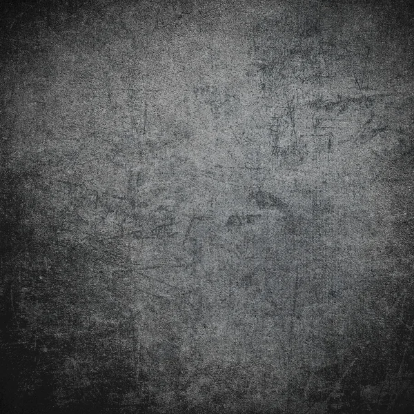 Scratched dark black or grey grunge concrete wall Royalty Free Stock Images