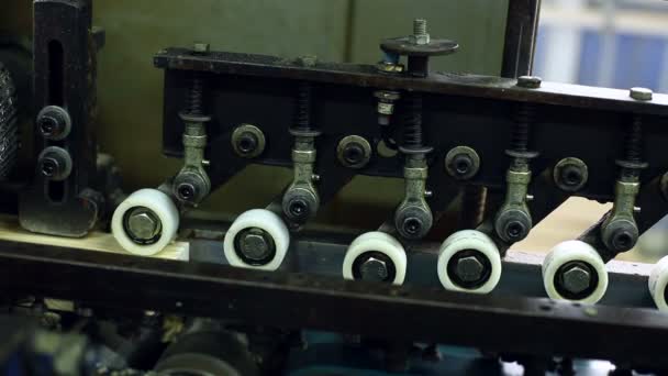 View of wooden slats moving on conveyor, close-up — Stock Video