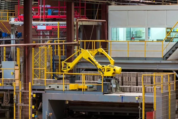 Modern machine in production of bricks — Stock Photo, Image