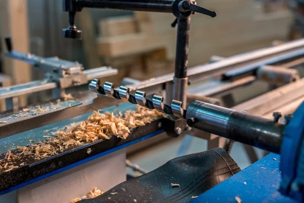 At sawmill. Drill and shavings underneath it — Stock Photo, Image